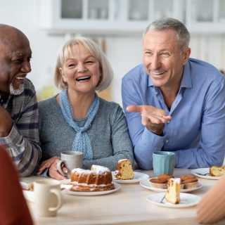 friends talking over coffee and dessert