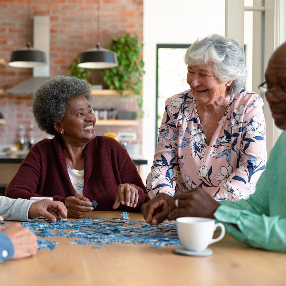 friends putting together a puzzle