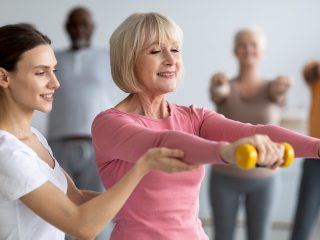 older woman at exercise class
