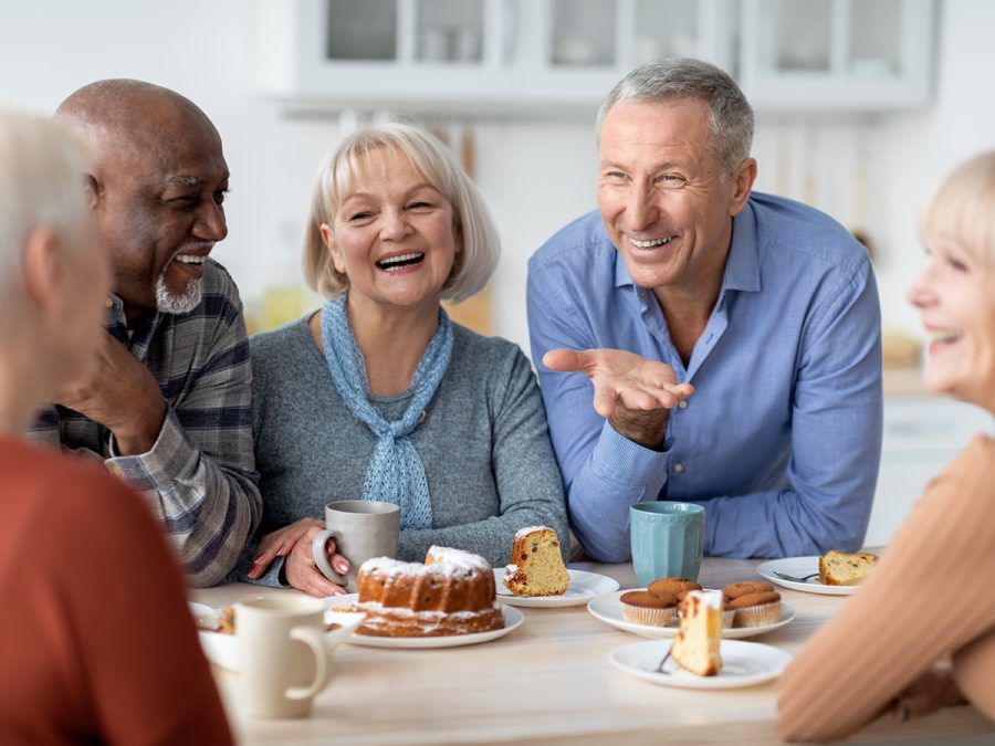 friends enjoying desert and conversation