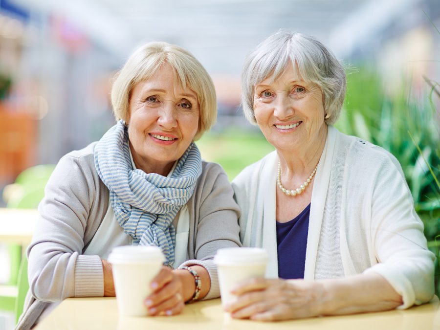 older ladies enjoying coffee