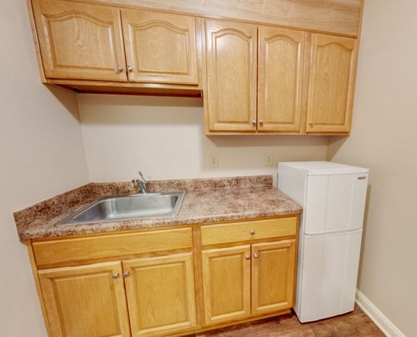 apartment sink and minifridge