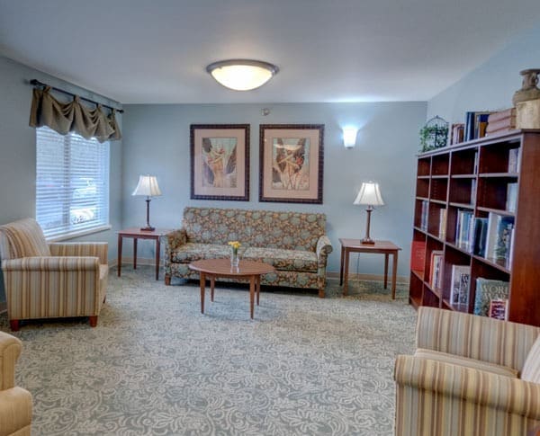 sitting room with a library