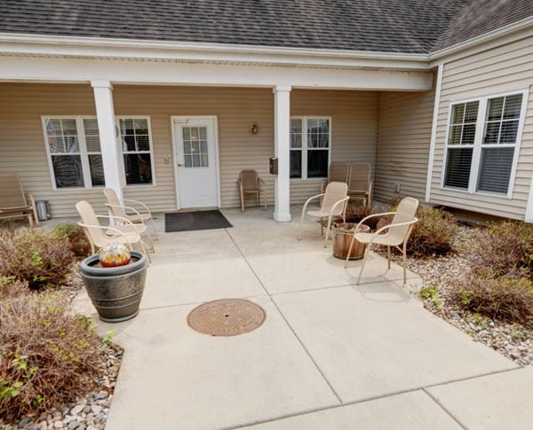 walkway with chairs on both sides