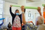 exercise class with foam tubes