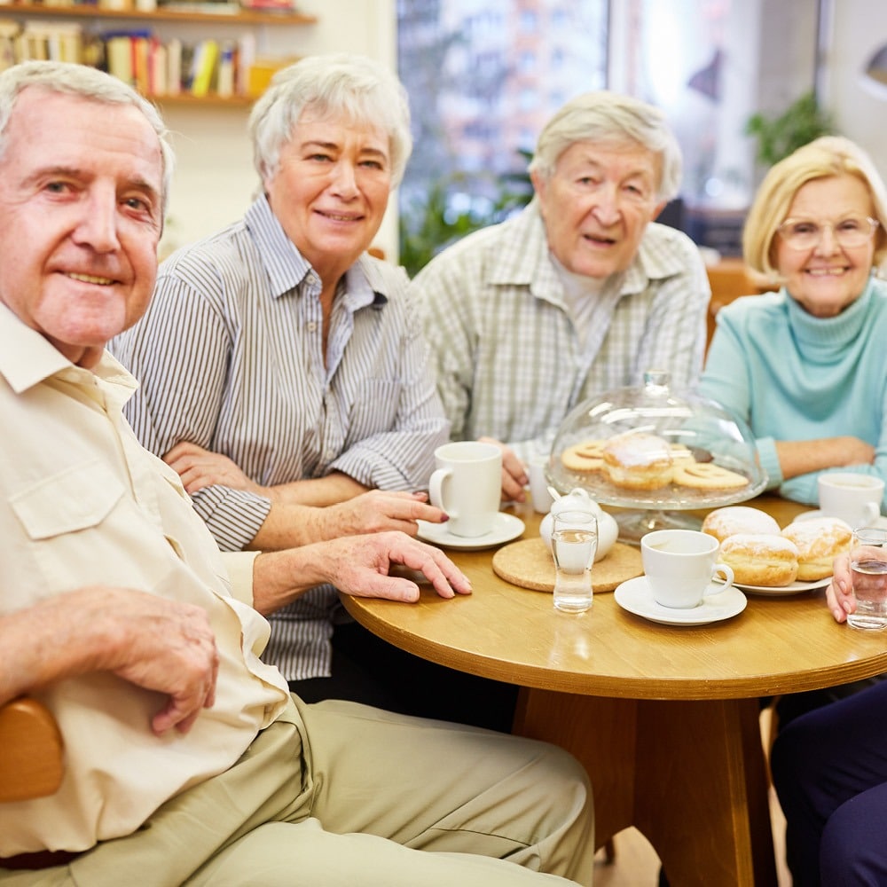 friends meeting for pastries and coffee