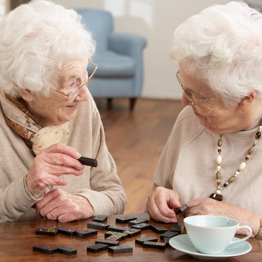 older ladies playing dominos