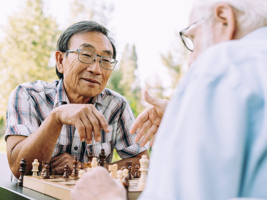 older friends playing chess