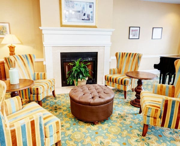 community sitting room with fireplace