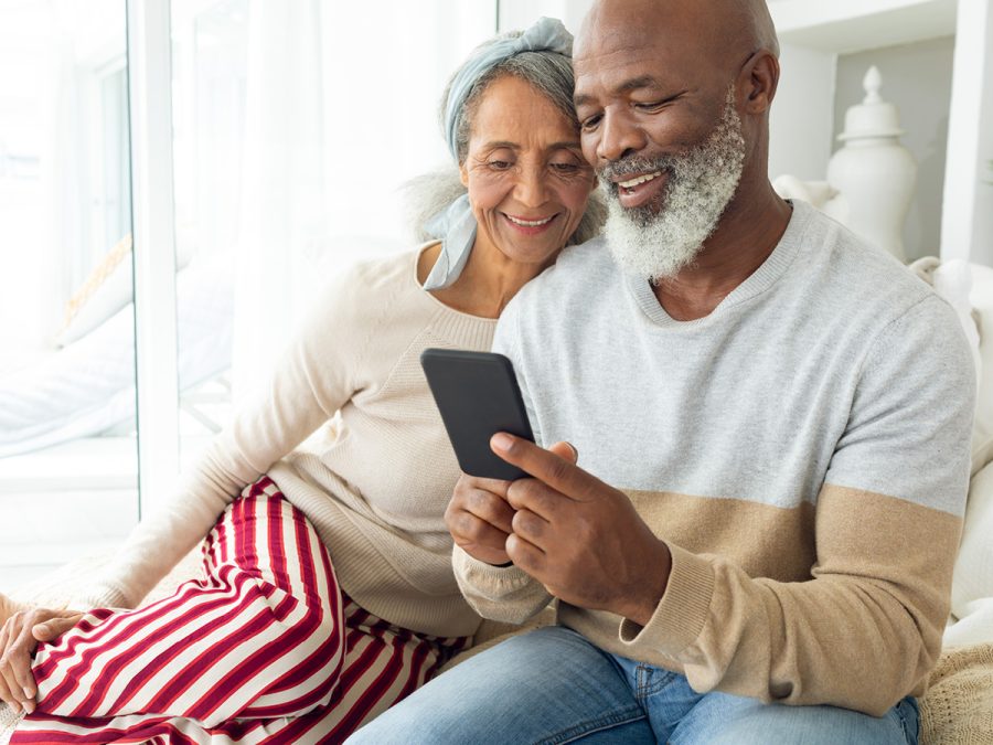 older couple looking at cell phone