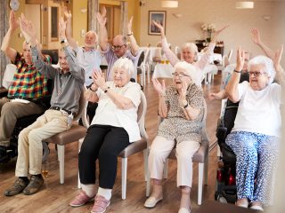 older people in a group activity