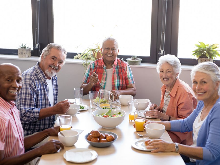 older people enjoying a meal